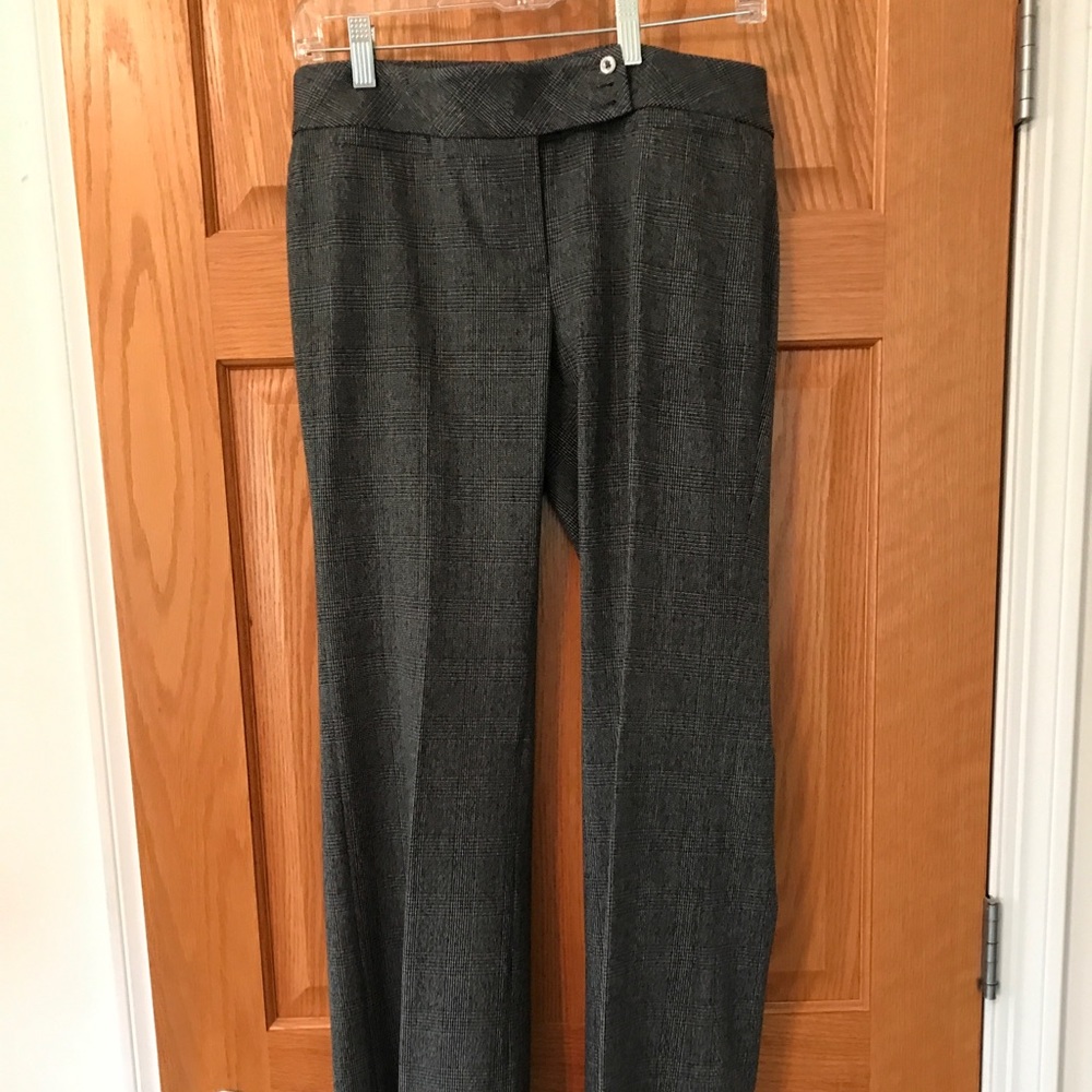 Low rise boot leg slacks with top pockets and back pockets